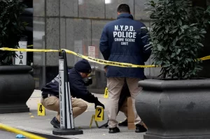 A gunman killed five people, including an off-duty NYPD officer, in a Midtown Manhattan office building before taking his own life. Authorities continue to investigate the motive behind the deadly shooting.